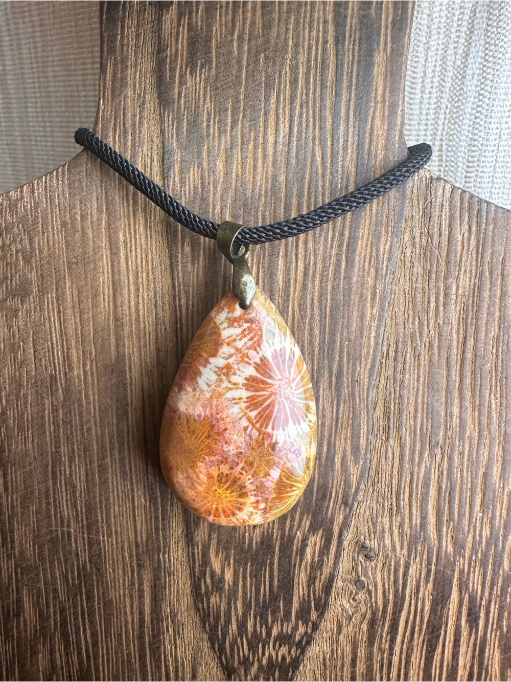 Orange and Black Coral Fossil Teardrop Pendant Necklace on Black Rope - Picture 9 of 16